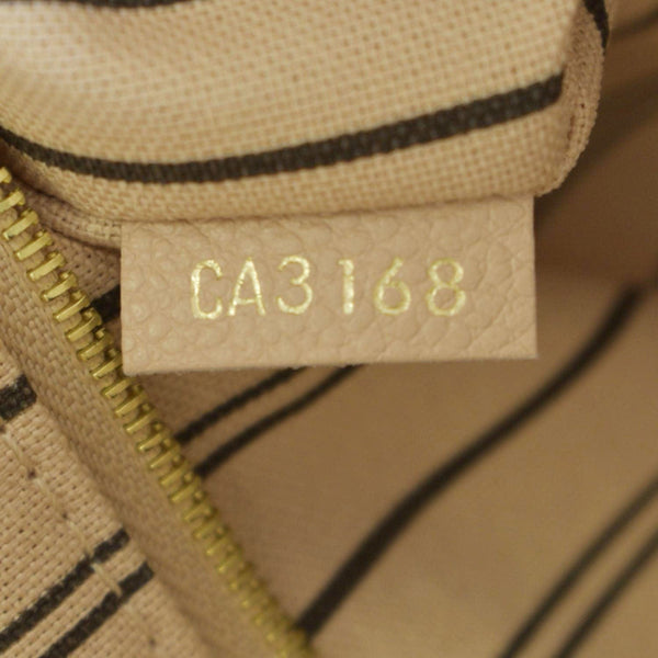 LOUIS VUITTON Artsy MM Empreinte Leather Hobo Bag Dune