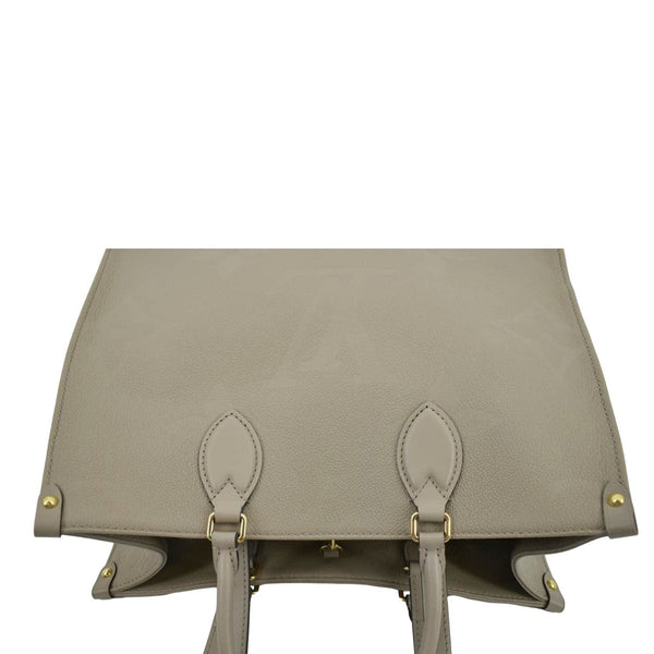LOUIS VUITTON Onthego MM Giant Monogram Empreinte Leather Tote Shoulder Bag Tourterelle Beige