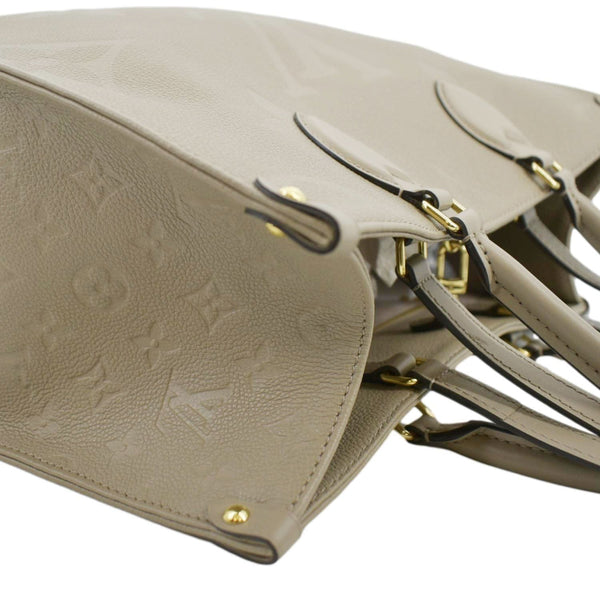 LOUIS VUITTON Onthego MM Giant Monogram Empreinte Leather Tote Shoulder Bag Tourterelle Beige