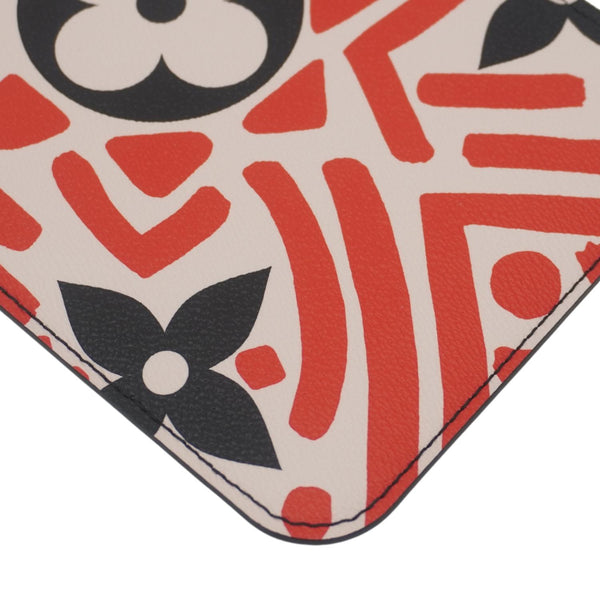 LOUIS VUITTON Neverfull Crafty Giant Monogram Canvas Wristlet Pouch Red