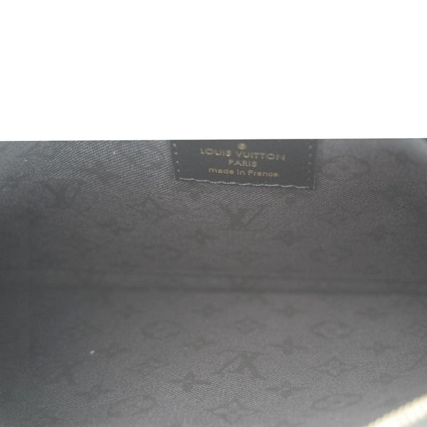 LOUIS VUITTON Neverfull Crafty Giant Monogram Canvas Wristlet Pouch Red