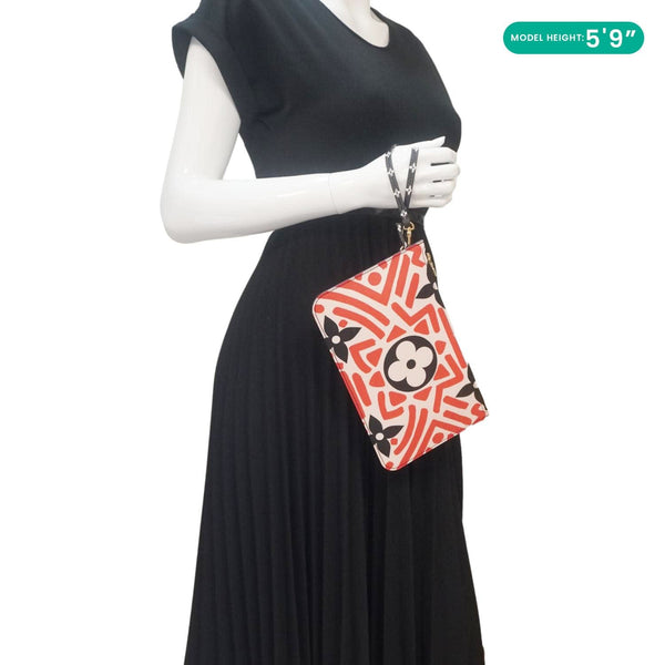 LOUIS VUITTON Neverfull Crafty Giant Monogram Canvas Wristlet Pouch Red