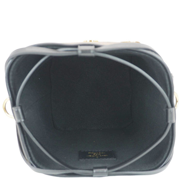 LOUIS VUITTON Noe Monogram Reverse Canvas Crossbody Bag Brown