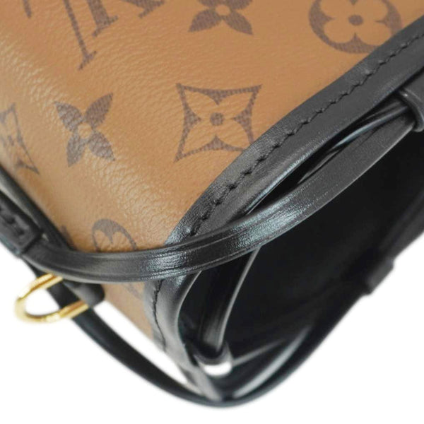 LOUIS VUITTON Noe Monogram Reverse Canvas Crossbody Bag Brown