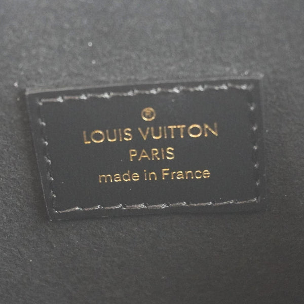 LOUIS VUITTON Noe Monogram Reverse Canvas Crossbody Bag Brown