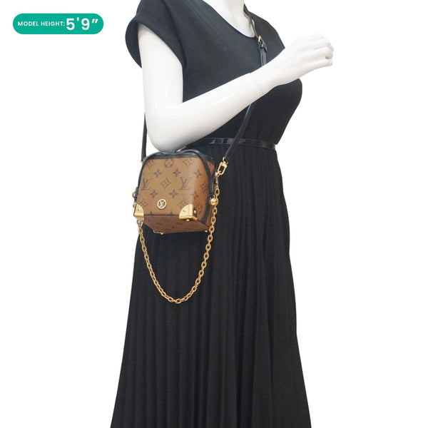 LOUIS VUITTON Noe Monogram Reverse Canvas Crossbody Bag Brown