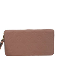 LOUIS VUITTON Monogram Empreinte Leather Zippy Wallet Rose Pink