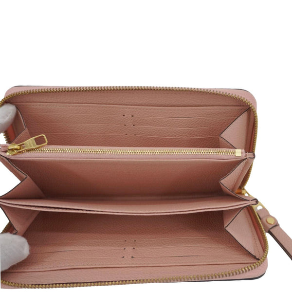 LOUIS VUITTON Monogram Empreinte Leather Zippy Wallet Rose Pink