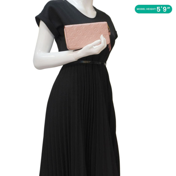 LOUIS VUITTON Monogram Empreinte Leather Zippy Wallet Rose Pink