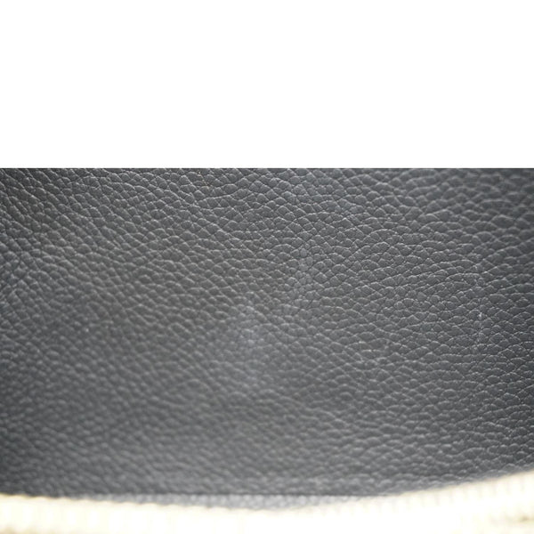 LOUIS VUITTON Clemence Monogram Empreinte Leather Wallet Black