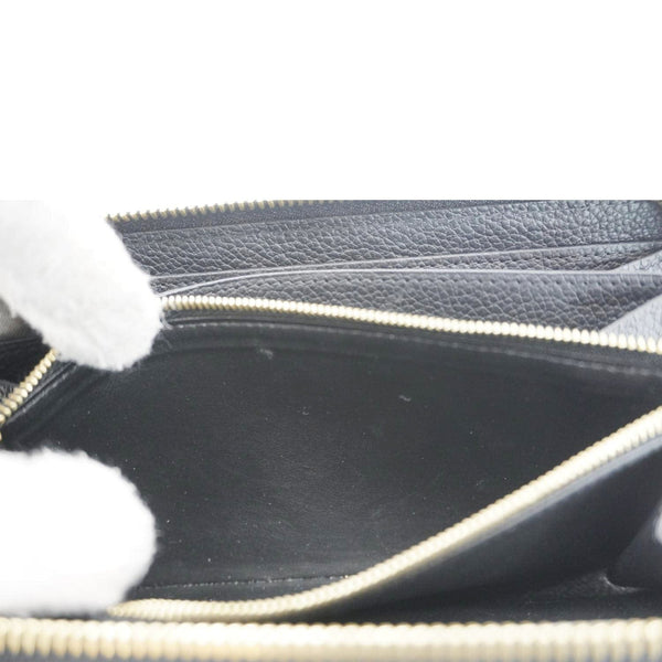 LOUIS VUITTON Clemence Monogram Empreinte Leather Wallet Black