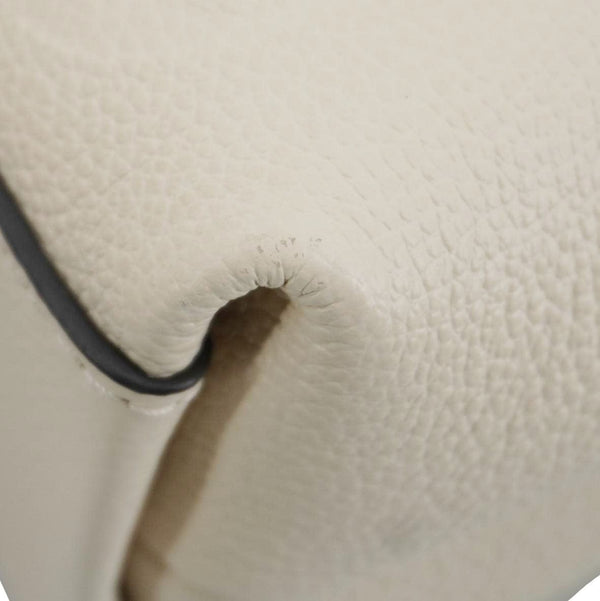 LOUIS VUITTON Madeleine MM Monogram Empreinte Leather Top Handle Bag White
