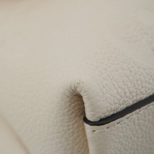 LOUIS VUITTON Madeleine MM Monogram Empreinte Leather Top Handle Bag White