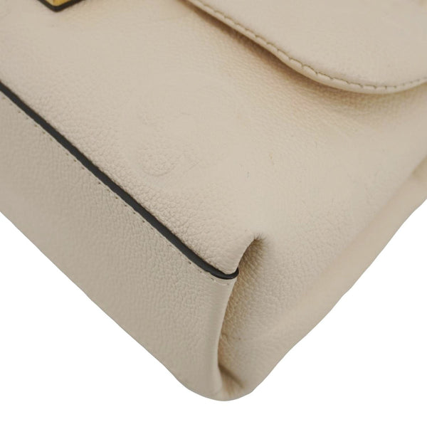 LOUIS VUITTON Madeleine MM Monogram Empreinte Leather Top Handle Bag White