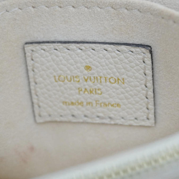 LOUIS VUITTON Madeleine MM Monogram Empreinte Leather Top Handle Bag White