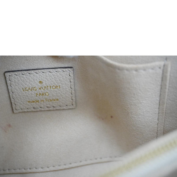 LOUIS VUITTON Madeleine MM Monogram Empreinte Leather Top Handle Bag White