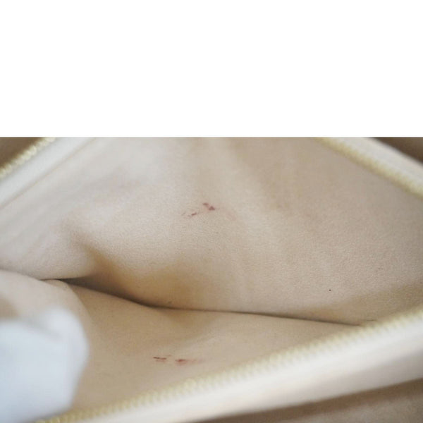 LOUIS VUITTON Madeleine MM Monogram Empreinte Leather Top Handle Bag White