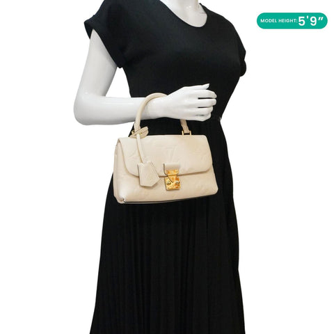 LOUIS VUITTON Madeleine MM Monogram Empreinte Leather Top Handle Bag White