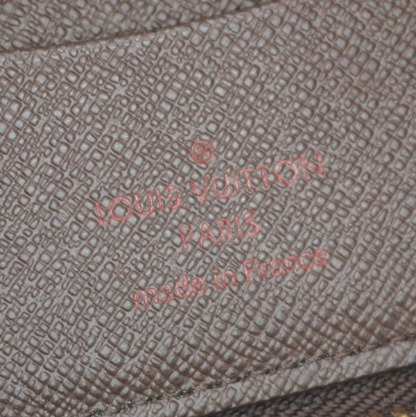LOUIS VUITTON Zip Around Damier Ebene Wallet Brown