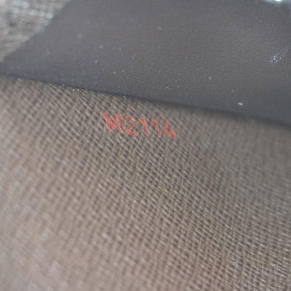 LOUIS VUITTON Zip Around Damier Ebene Wallet Brown