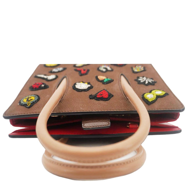 CHRISTIAN LOUBOUTIN Paloma Small Patches Leather Top Handle Crossbody Bag Brown