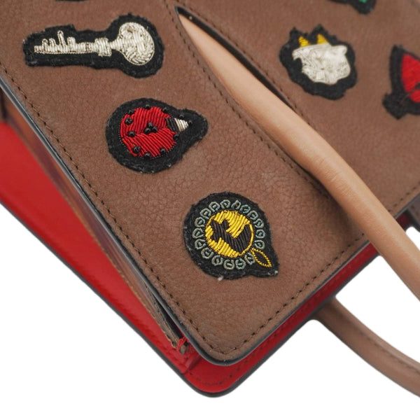 CHRISTIAN LOUBOUTIN Paloma Small Patches Leather Top Handle Crossbody Bag Brown