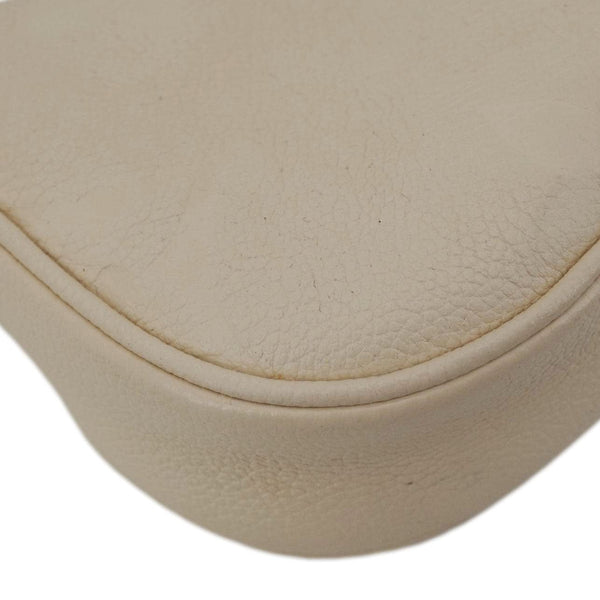 LOUIS VUITTON Moon Mini Monogram Empreinte Leather Hobo Bag Creme