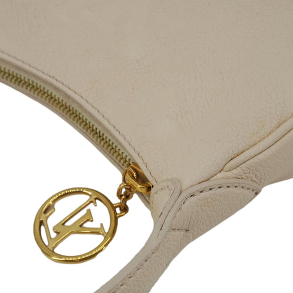 LOUIS VUITTON Moon Mini Monogram Empreinte Leather Hobo Bag Creme