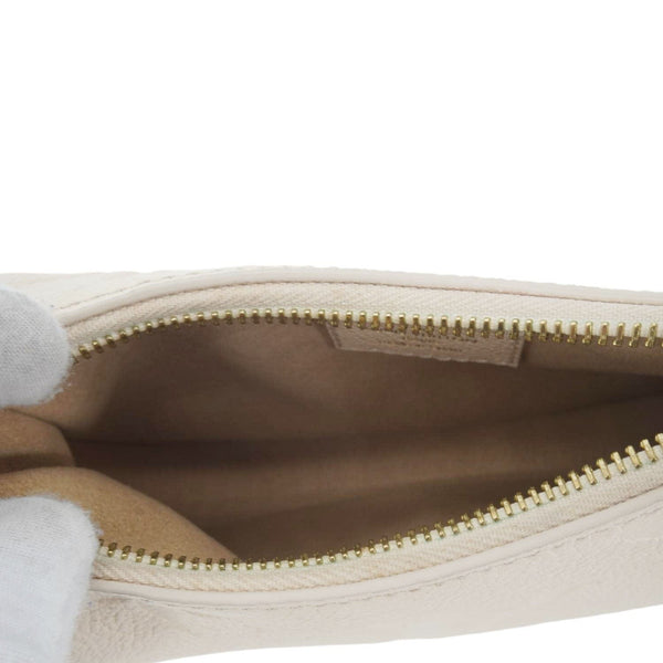 LOUIS VUITTON Moon Mini Monogram Empreinte Leather Hobo Bag Creme