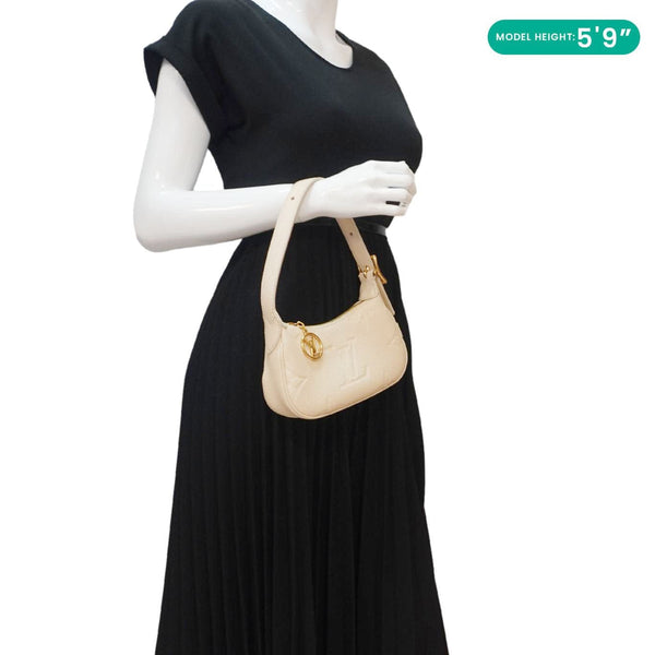 LOUIS VUITTON Moon Mini Monogram Empreinte Leather Hobo Bag Creme
