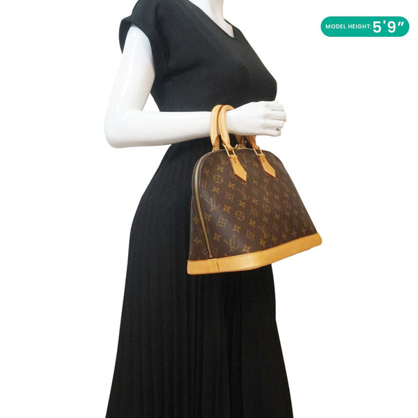 LOUIS VUITTON Alma PM Monogram Canvas Satchel Bag Brown