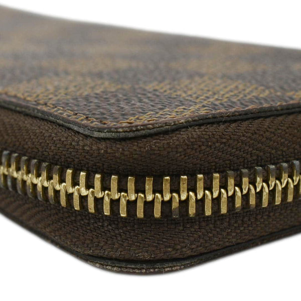 LOUIS VUITTON Clemence Damier Ebene Zippy Wallet Brown