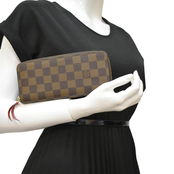 LOUIS VUITTON Clemence Damier Ebene Zippy Wallet Brown