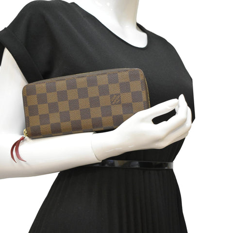 LOUIS VUITTON Clemence Damier Ebene Zippy Wallet Brown