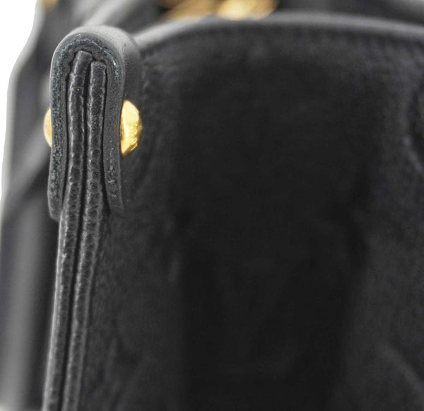 LOUIS VUITTON Onthego PM Giant Monogram Empreinte Leather Shoulder Bag Black