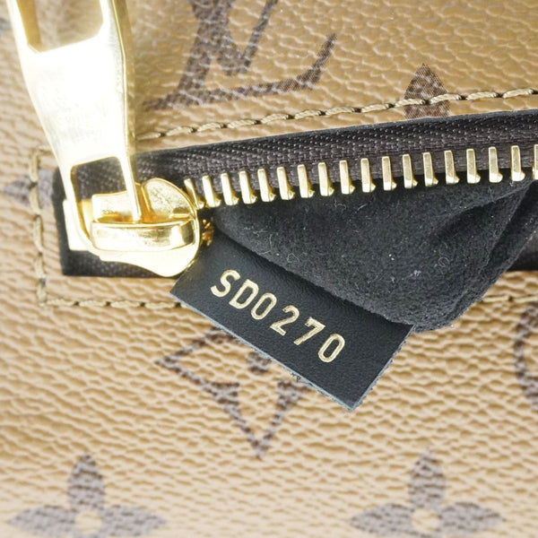 LOUIS VUITTON Metis Pochette Reverse Monogram Canvas Crossbody Bag Brown
