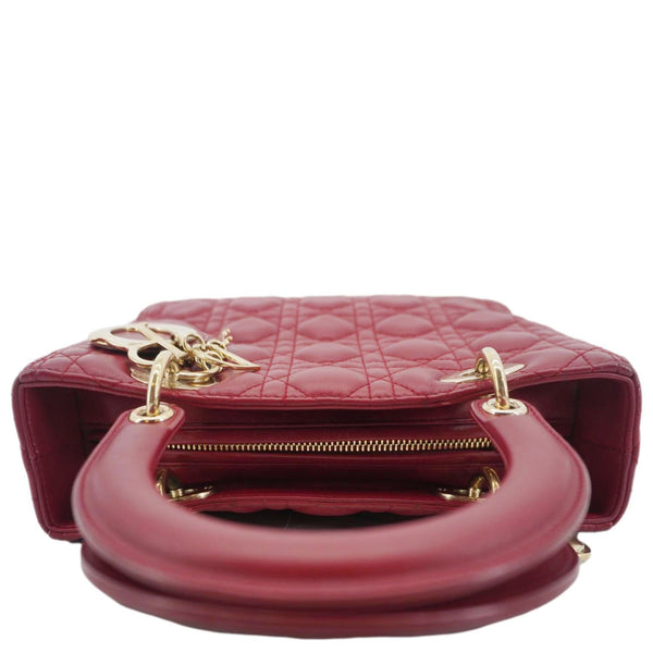 Top view of Lady Dior Red Leather Bag with gold hardware handles