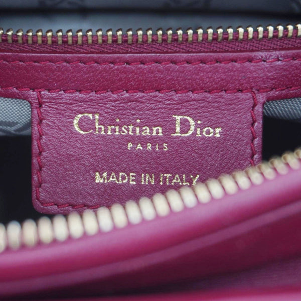 Dior logo-engraved zipper hardware on Lady Dior Medium Bag