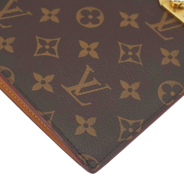 LOUIS VUITTON Legacy Monogram Canvas Chain Clutch Brown