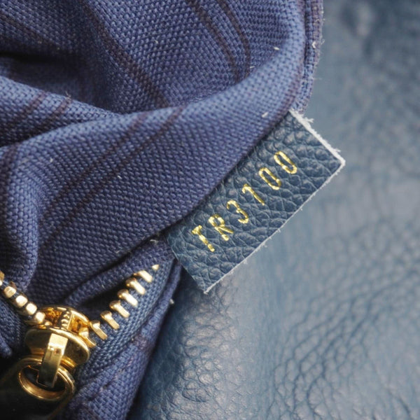 LOUIS VUITTON Artsy MM Monogram Empreinte Leather Hobo Bag Navy Blue