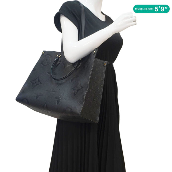 LOUIS VUITTON Onthego MM Giant Monogram Empreinte Leather Tote Bag Black