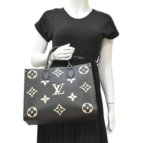 LOUIS VUITTON Onthego MM Giant Monogram Empreinte Leather Tote Bag Bicolor