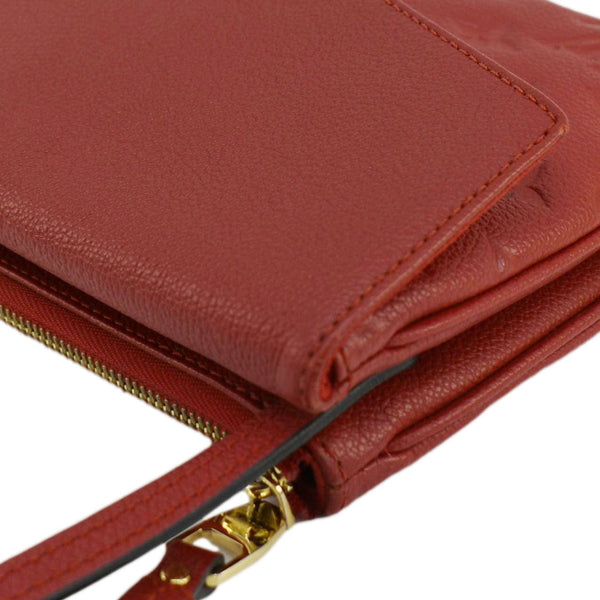 LOUIS VUITTON Twice Pochette Monogram Empreinte Crossbody Bag Red