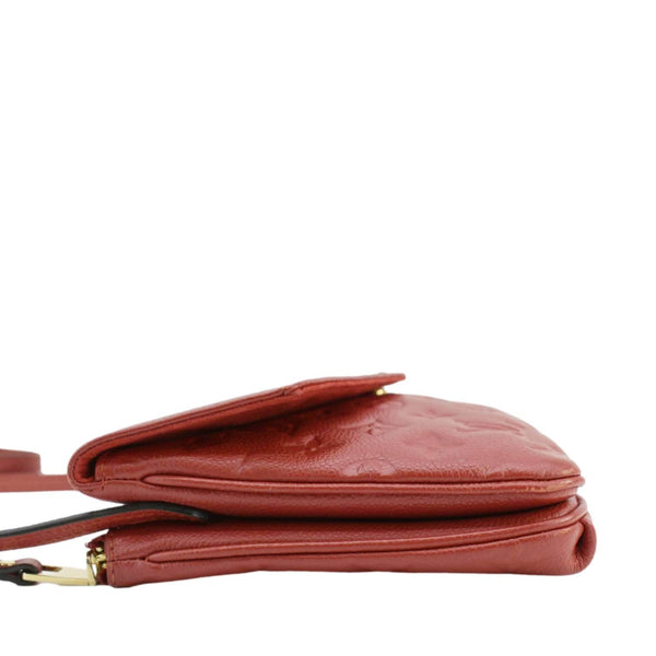 LOUIS VUITTON Twice Pochette Monogram Empreinte Crossbody Bag Red