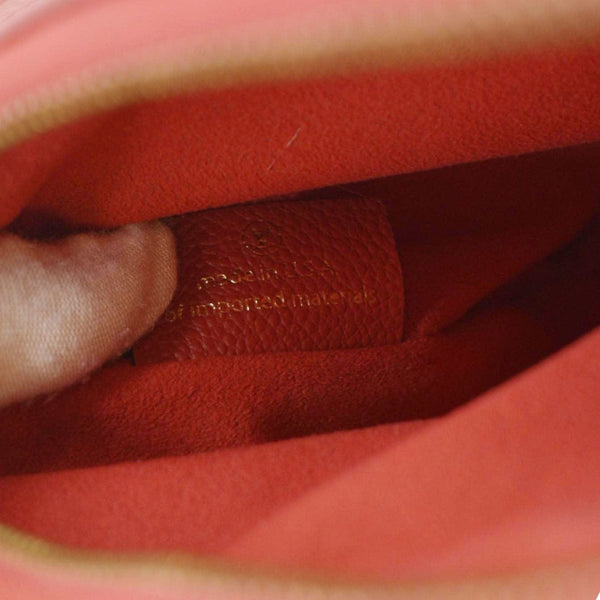 LOUIS VUITTON Twice Pochette Monogram Empreinte Crossbody Bag Red