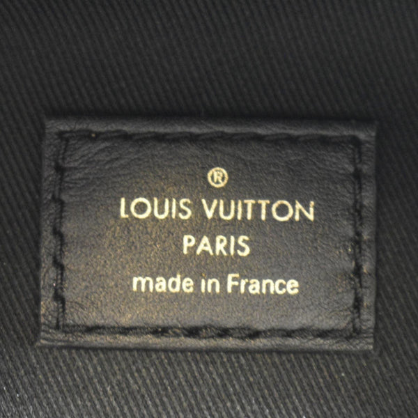 LOUIS VUITTON New Wave Quilted Leather Crossbody Black with logo