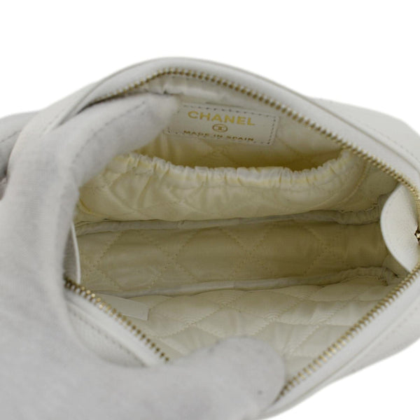 CHANEL Curvy Small Quilted Caviar Leather Cosmetic Pouch White