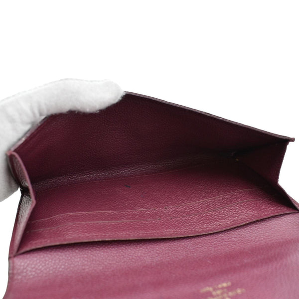 LOUIS VUITTON Sarah Monogram Empreinte Leather Wallet Aurore