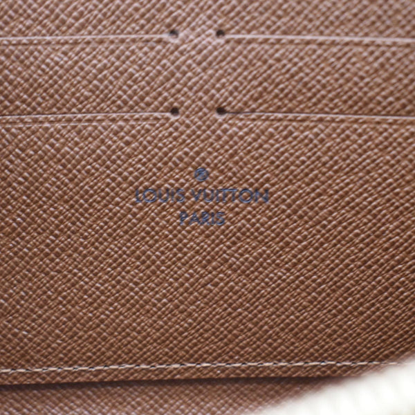 LOUIS VUITTON Monogram Canvas Zippy Wallet Brown