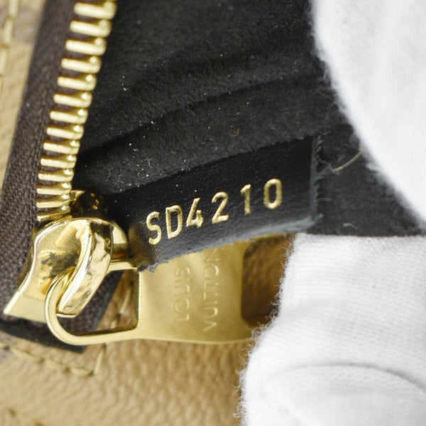 LOUIS VUITTON Metis Pochette Reverse Monogram Canvas Crossbody Bag Brown